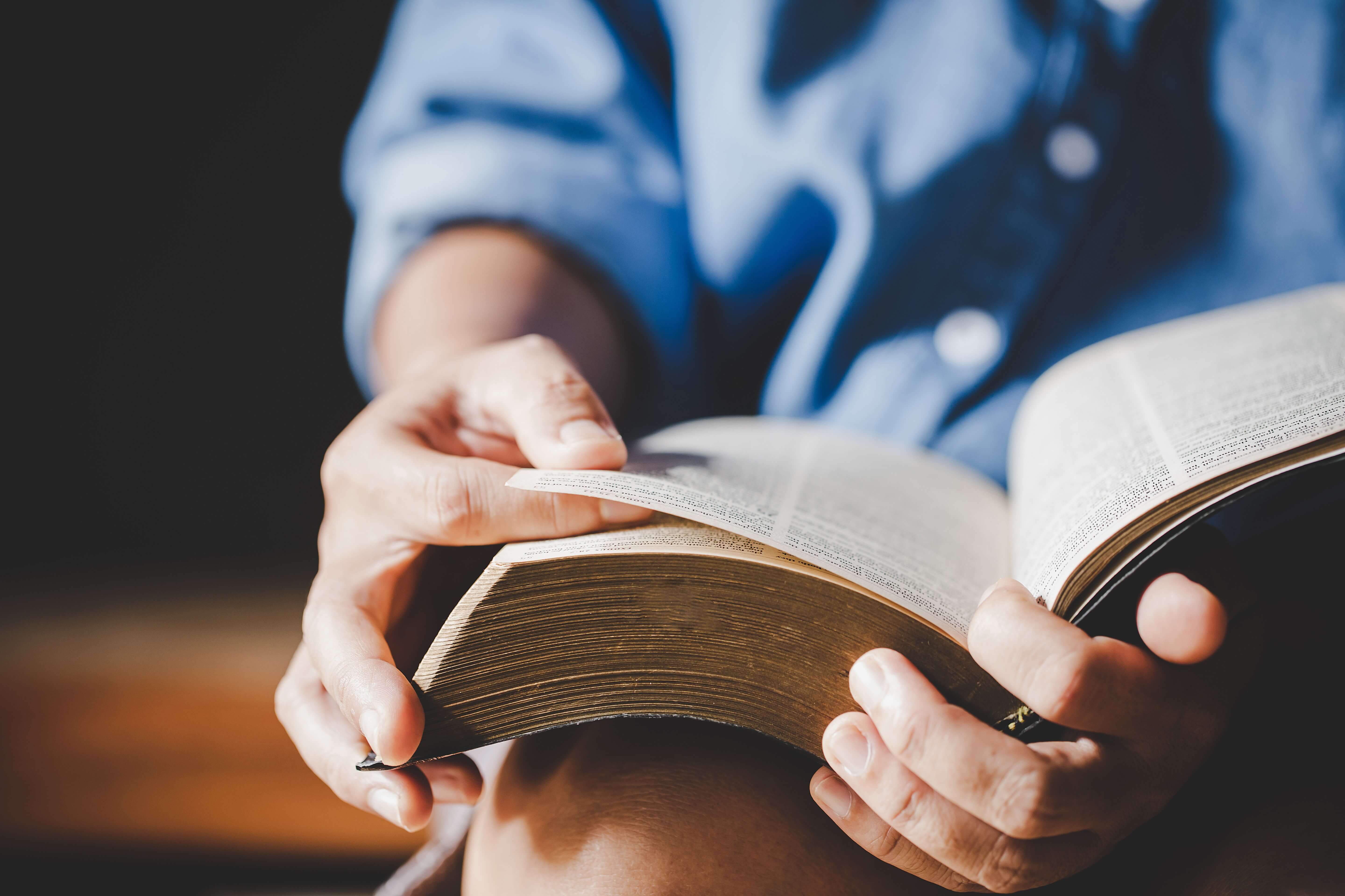 man reading bible